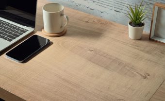 simple-workplace-with-smart-phone-laptop-and-cup